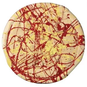 MARTIN KIPPENBERGER, Schlecht belegte Studentenpizza gepollockt / Poorly topped student pizza, pollocked, 1993 diameter 45,1 cm / 17 3/4 inches carved and painted wood, signed, numbered edition 10 + 5 AP This multiple was issued in 3 variations: full pizza, half and quarter slices. Ref. “Kippenberger: Multiples,” Verlag der Buchhandlung Walther König, Cologne, 2003, 120-121 pp.