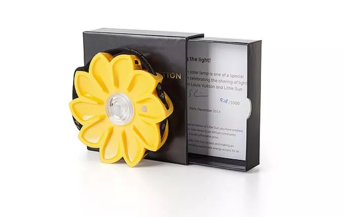 Olafur Eliasson: ‘Little Sun’. 2014. This high-quality solar-powered LED lamp, developed by artist Olafur Eliasson and engineer Frederik Ottesen, captures the sunrays with its solar panel and offers 4 to 10 hours of light! It is more than just a useful artpiece, it is a social business focused on getting clean, reliable, affordable light to the 1.2 billion people worldwide without access to electricity. Check out the Little Sun website for more information about this wonderful project. This Little Sun Collectors Edition comes with its customized Louis Vuitton box, Louis Vuitton ribbon and signed and numbered COA. The Collectors Edition was released in collaboration with Fondation Louis Vuitton in 2014. Medium: sunshaped solar-powered LED lamp designed by Olafur Eliasson, customized LV box and ribbon. Dimensions: 115 mm x 115 mm. Components: High quality LED lamp, 3 x AAA rechargeable batteries , high quality solar panel 0,5V, body made of U.V.